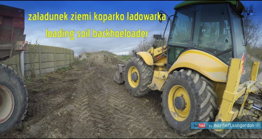 załadunek ziemi koparko ładowarka | loading soil backhoeloader